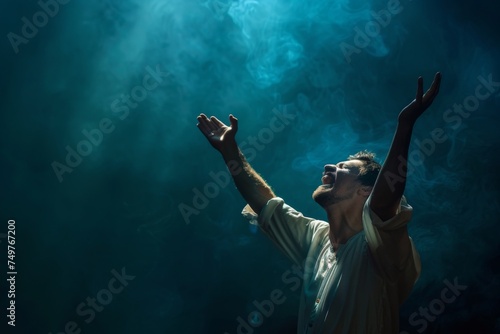 Obraz na płótnie A Christian man praying to God crying and emotional with his arms raised w salonie