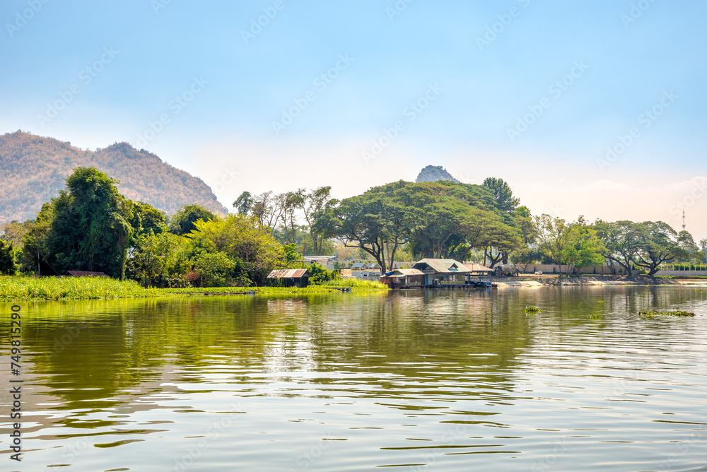 Views of nature and surroundings while sailing on the river Kwai in Thailand
