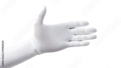 Human hand in white glove. A white glove with a visible thumb on it, laying on a flat surface. The thumb is slightly bent, showing the flexibility of the glove material.
