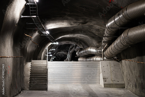 Картината върху платно dark, black passages - tunnel system in an underground power station