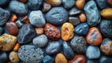 a close up of a bunch of rocks with different colors and sizes of rocks on top of eachother.
