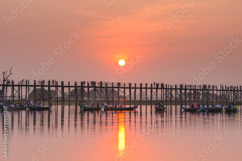 Sunset with silhouette of u bein bridge in Amarapura township, myanmar © Richie Chan