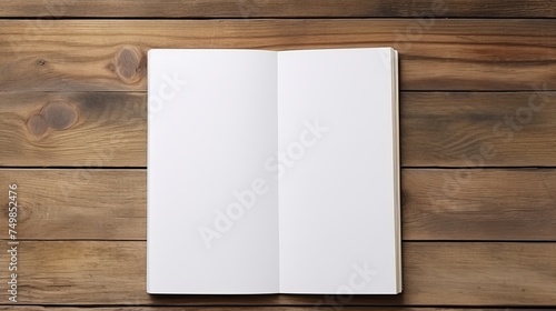 Top View of Blank Book on Wooden Table Background.