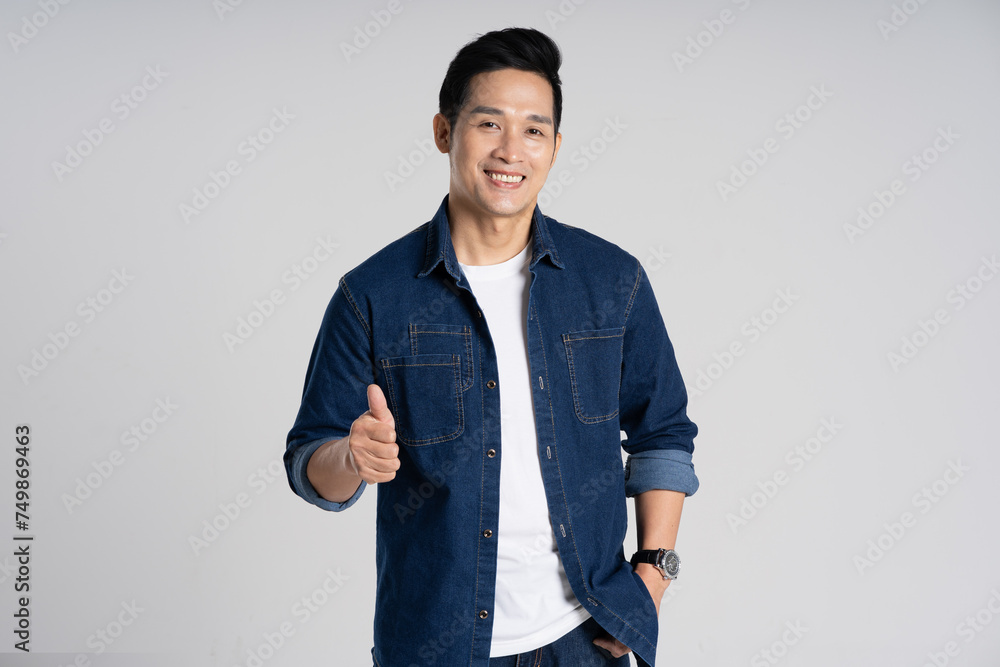 Portrait of Asian man posing on white background Portrait of Asian man posing on white background