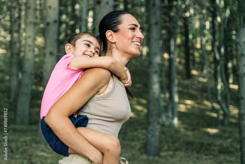 Joyful Mother-Daughter Embrace in Nature