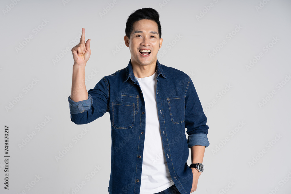 Portrait of Asian man posing on white background Portrait of Asian man posing on white background