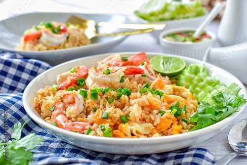 Fried rice with shrimps on white plate