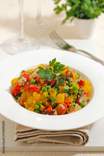 Stewed pumpkin with peas.