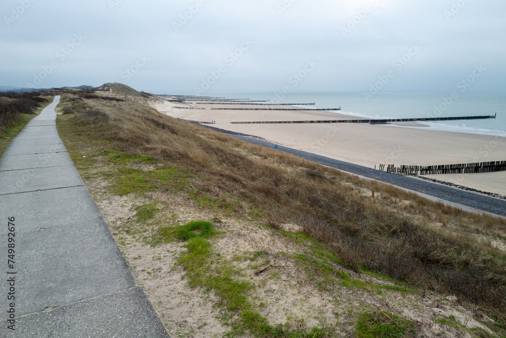 wide path high above the dunes on the north sea Zeeland Netherlands wide path high above the dunes on the north sea Zeeland Netherlands