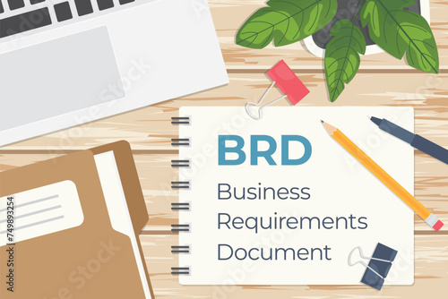 BRD Business Requirements Document, flat lay office composition on wooden desk; BRD is a comprehensive document detailing the business objectives and functional requirements of a project