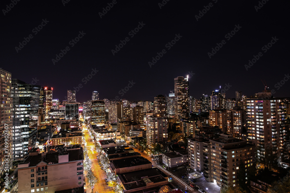 aerial view or the famous Robson Street in Vancouver by night
