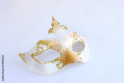 Photo of elegant and delicate Venetian mask isolated on white background