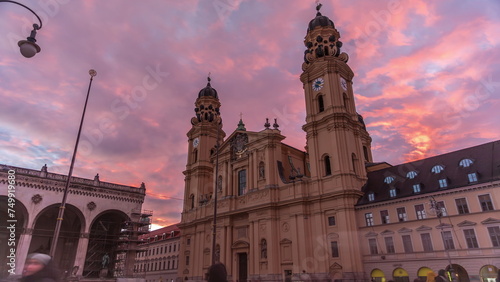 The Theatine Church of St. Cajetan timelapse during sunset. Munich, Germany photo