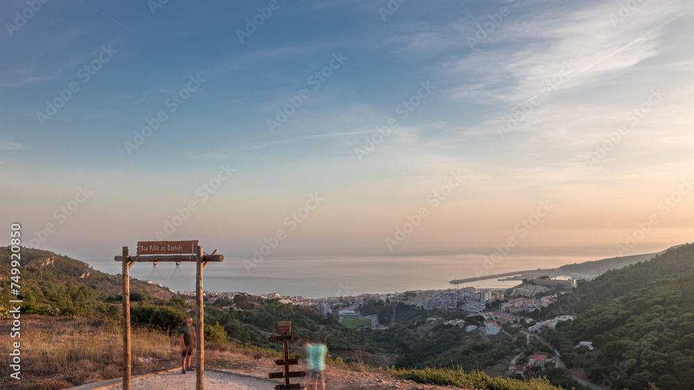 Panorama showing aerial View of Sesimbra Town and Port during sunset timelapse, Portugal.