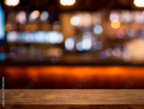 Empty wooden bar counter with blurred