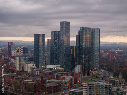 Aerial drone shot across Manchester shot from the west looking east at Deansgate Square  Manchester  UK