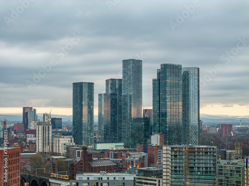 Aerial drone shot across Manchester shot from the west looking east at Deansgate Square, Manchester, UK