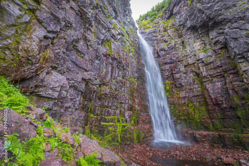 Njupesk  r is a waterfall in northwestern Dalarna  formed by Njup  n in Fulufj  llets nationalpark