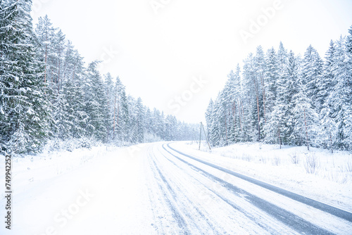 Beautiful winter landscape with snow covered trees in the forest. Christmas background. © Jiri Dolezal