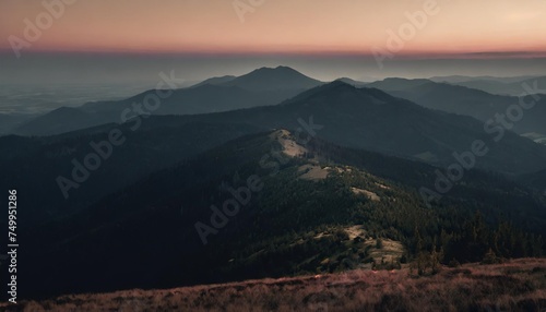 view from the mount biskupia kopa at sunset sudetes mountains in central europe poland