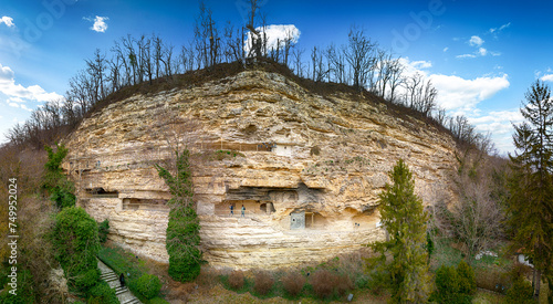 Rocky cliff with Aladzha Orthodox cave monastery in Golden Sands Nature Park, Bulgaria
 photo