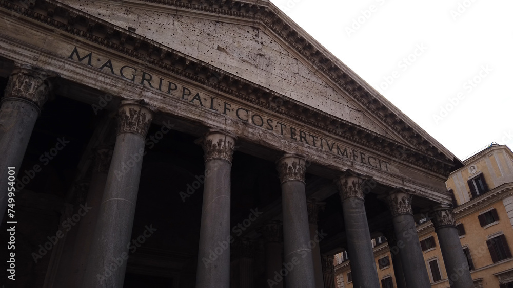 The Roman Pantheon is the best-preserved building from ancient Rome, Italy, and was completed in c. 125 CE. Latin letters mean: The Roman Pantheon is the best-preserved building from ancient Rome, Italy, and was completed in c. 125 CE. Latin letters mean: