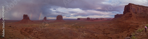 The Monument Valley Navajo Tribal Park in Arizona  USA. View of a storm and double rainbow over the West Mitten Butte  East Mitten Butte  and Merrick Butte Monuments.