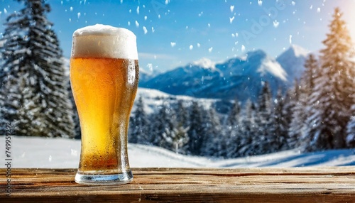 glassof cold beer and winter time landscape of mountains and empty space for your decoration christmas time