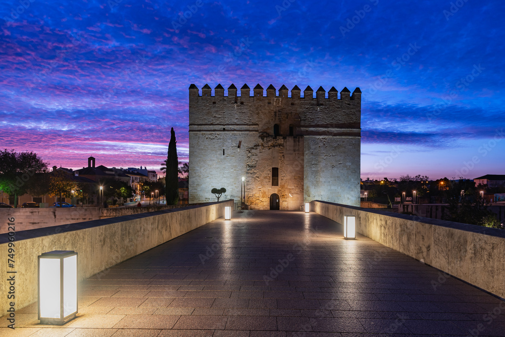 Torre de la Calahorra at dawn at one end of the Roman bridge of Cordoba, currently the Living Museum of Al-andalus, Andalucia.