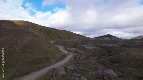 Obraz na płótnie Car driving off-road terrain exploring the Fjallabak Natural Reserve. A 4x4 car driving dirt road traveling in Iceland sightseeing wilderness. w salonie