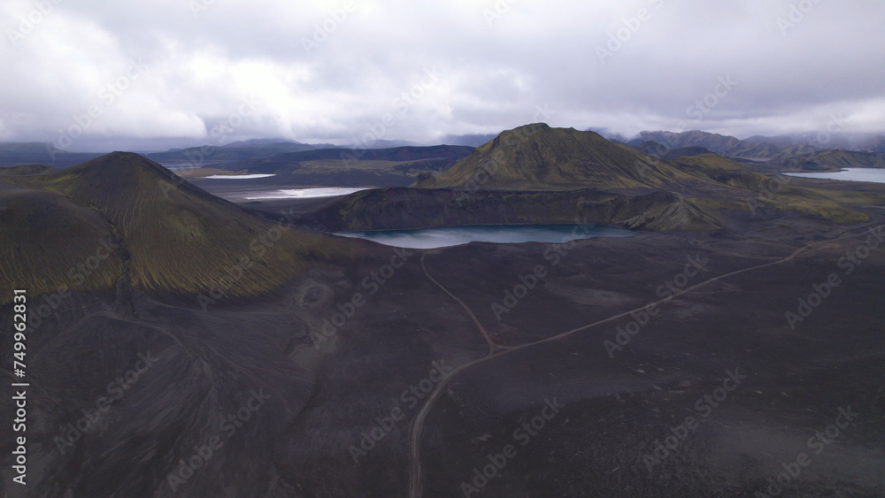 Blahylur lake, spelled Bláhylur in Icelandic and also known as Hnausapollur, is a stunning crater lake located near Landmannalaugar in the Southern Highlands, Iceland.