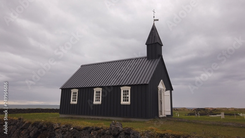 Obraz na płótnie Budakirkja is a small wooden church located on the south side of Snaefellsnes Peninsula in Iceland. The Búðakirkja was built for the first time in 1703. w salonie