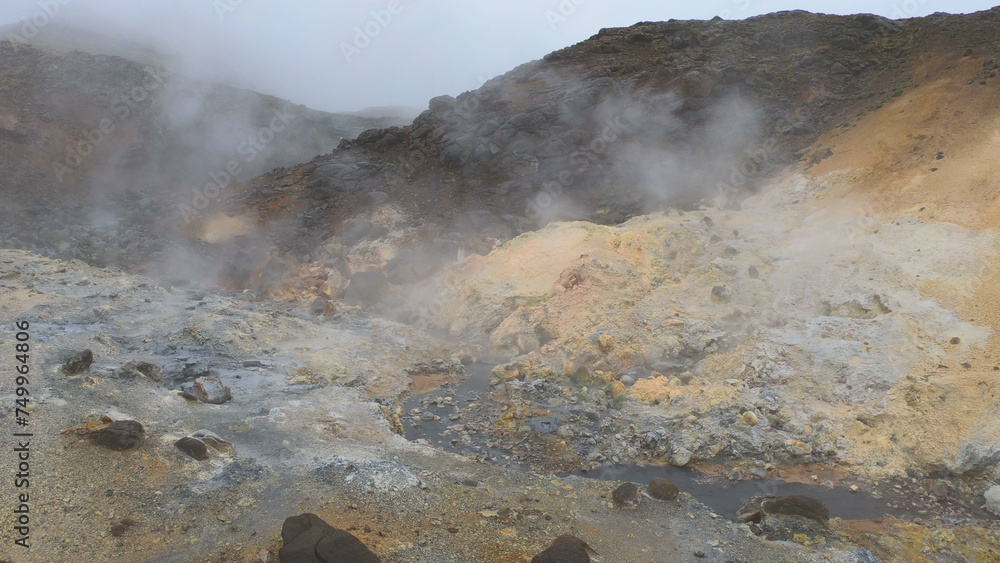 Seltún - the colourful Geothermal Area at Krýsuvík, Iceland. Krýsuvík geothermal area is defined by mud pots, hot springs, and steaming vents. The multi-colored mineral deposits at Krysuvik.
