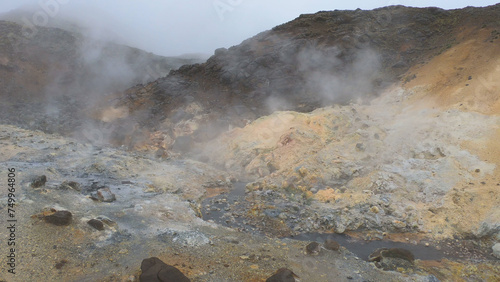 Obraz na płótnie Seltún - the colourful Geothermal Area at Krýsuvík, Iceland. Krýsuvík geothermal area is defined by mud pots, hot springs, and steaming vents. The multi-colored mineral deposits at Krysuvik. w salonie