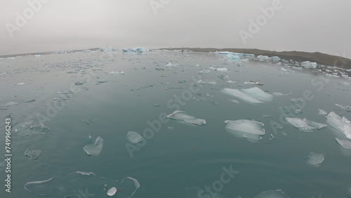 Obraz na płótnie View from a boat of Jokulsarlon Glacier Lagoon in Iceland. Melting icebergs floating. w salonie