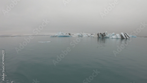Obraz na płótnie View from a boat of Jokulsarlon Glacier Lagoon in Iceland. Melting icebergs floating. w salonie