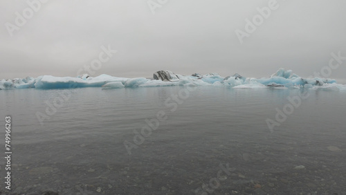 Obraz na płótnie View from a boat of Jokulsarlon Glacier Lagoon in Iceland. Melting icebergs floating. w salonie