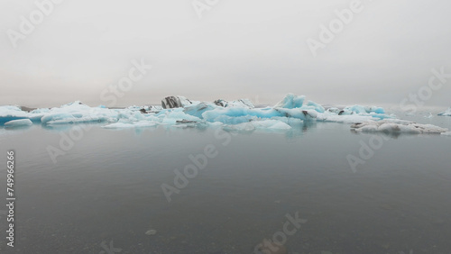Obraz na płótnie View from a boat of Jokulsarlon Glacier Lagoon in Iceland. Melting icebergs floating. w salonie