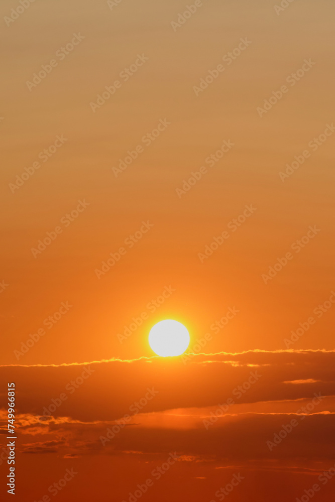Sunset over the sea with orange sky and clouds, background. Sunset over the sea with orange sky and clouds, background.