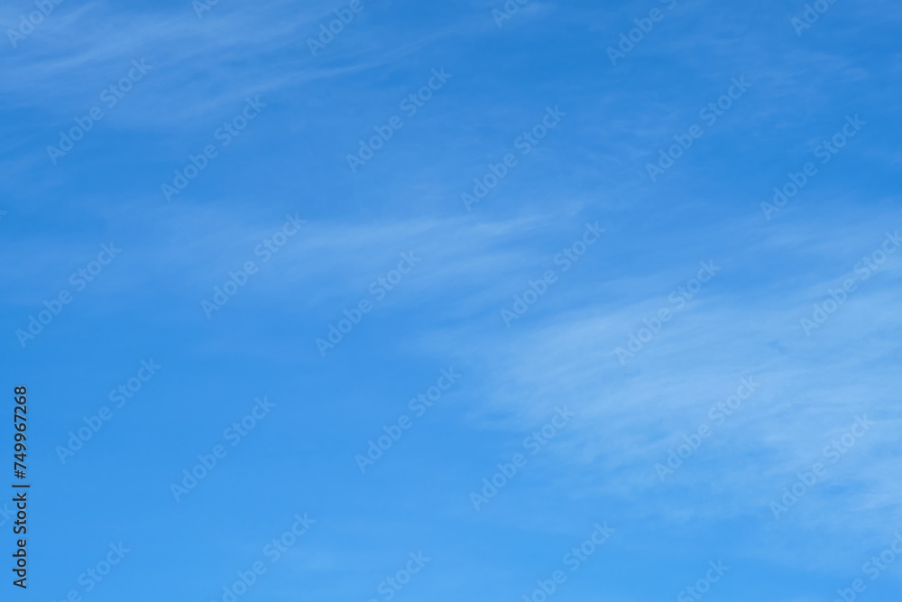 Blue sky and white clouds. Abstract nature background with copy space.