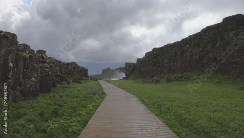 Obraz na płótnie Oxararfoss is a waterfall situated within Þingvellir National Park in Southwest Iceland. The waterfall flows out the river Oxará, cascading in two drops over the cliffs of Almannagjá gorge. w salonie