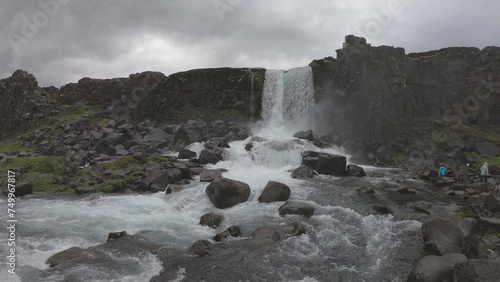 Obraz na płótnie Oxararfoss is a waterfall situated within Þingvellir National Park in Southwest Iceland. The waterfall flows out the river Oxará, cascading in two drops over the cliffs of Almannagjá gorge. w salonie