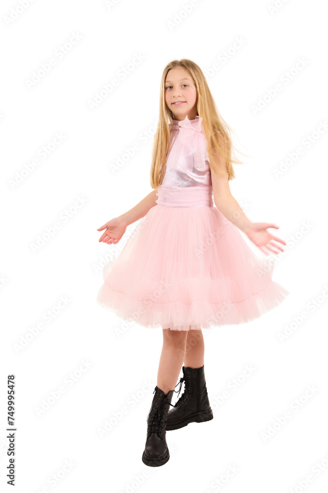 Young girl posing in elegant pink dress