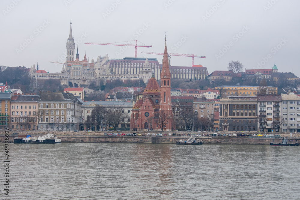 Fototapeta premium Budapest, Hungary. View over Danube River on Parliament Building, Buda Castle and Matthias Church.