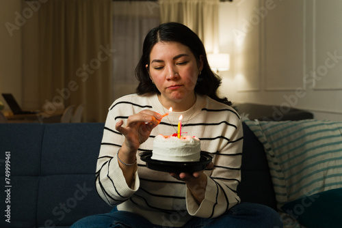 Caucasian sad woman feeling lonely on her birthday at home