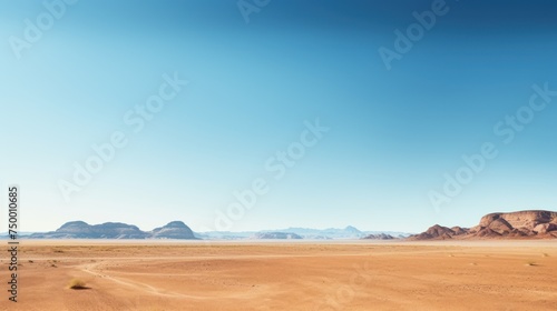 desert against clear blue sky, expanding desert, drought © CStock