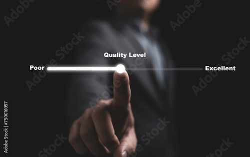 Businessman hand pointing to change quality level indicator scale from poor to excellent for customer satisfaction and evaluation concept.
