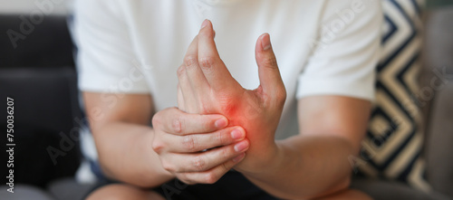 Quadro em tela close up employee man massage on hand palm after hard working to relief pain of