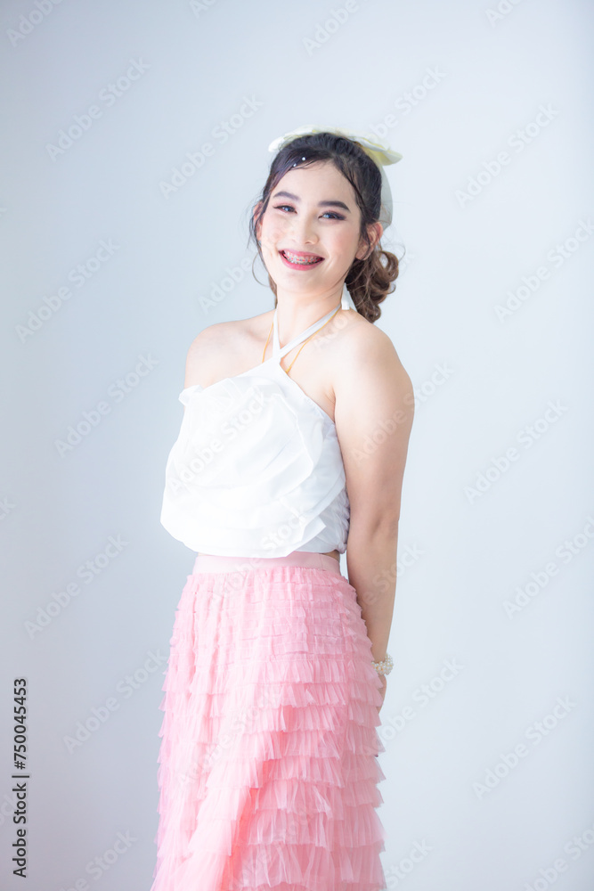 Asian girl isolated on white background,Portrait of Young beautiful Asian businesswoman standing and smiling isolated on white background, Looking at camera