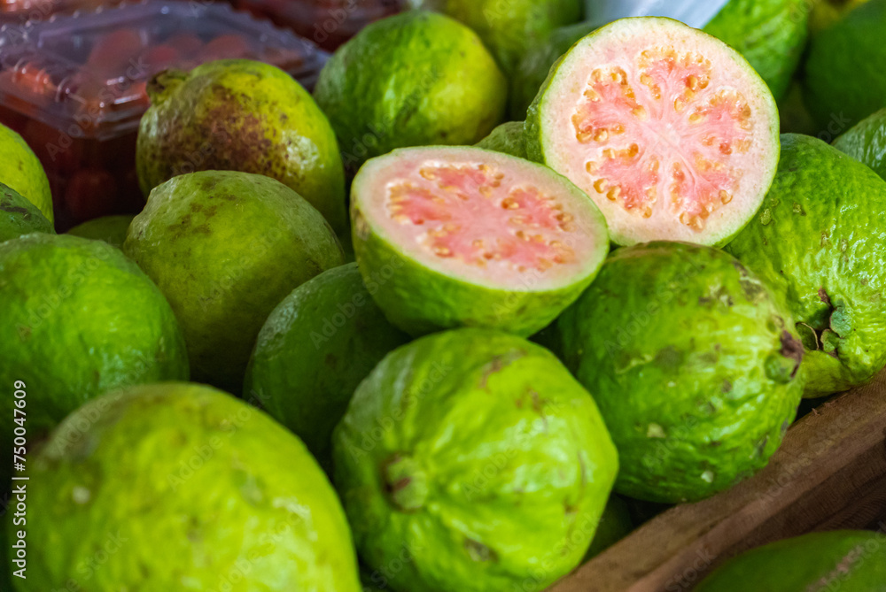 Typical tropical foods from Brazilian cuisine. Mango, orange, pineapple, chestnuts, guava, cheese and coffee. Typical tropical foods from Brazilian cuisine. Mango, orange, pineapple, chestnuts, guava, cheese and coffee.